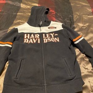 This is a ladies Harley Davidson, zip up, hooded sweatshirt, size xl
